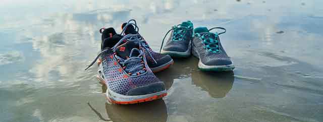 two pairs of running shoes